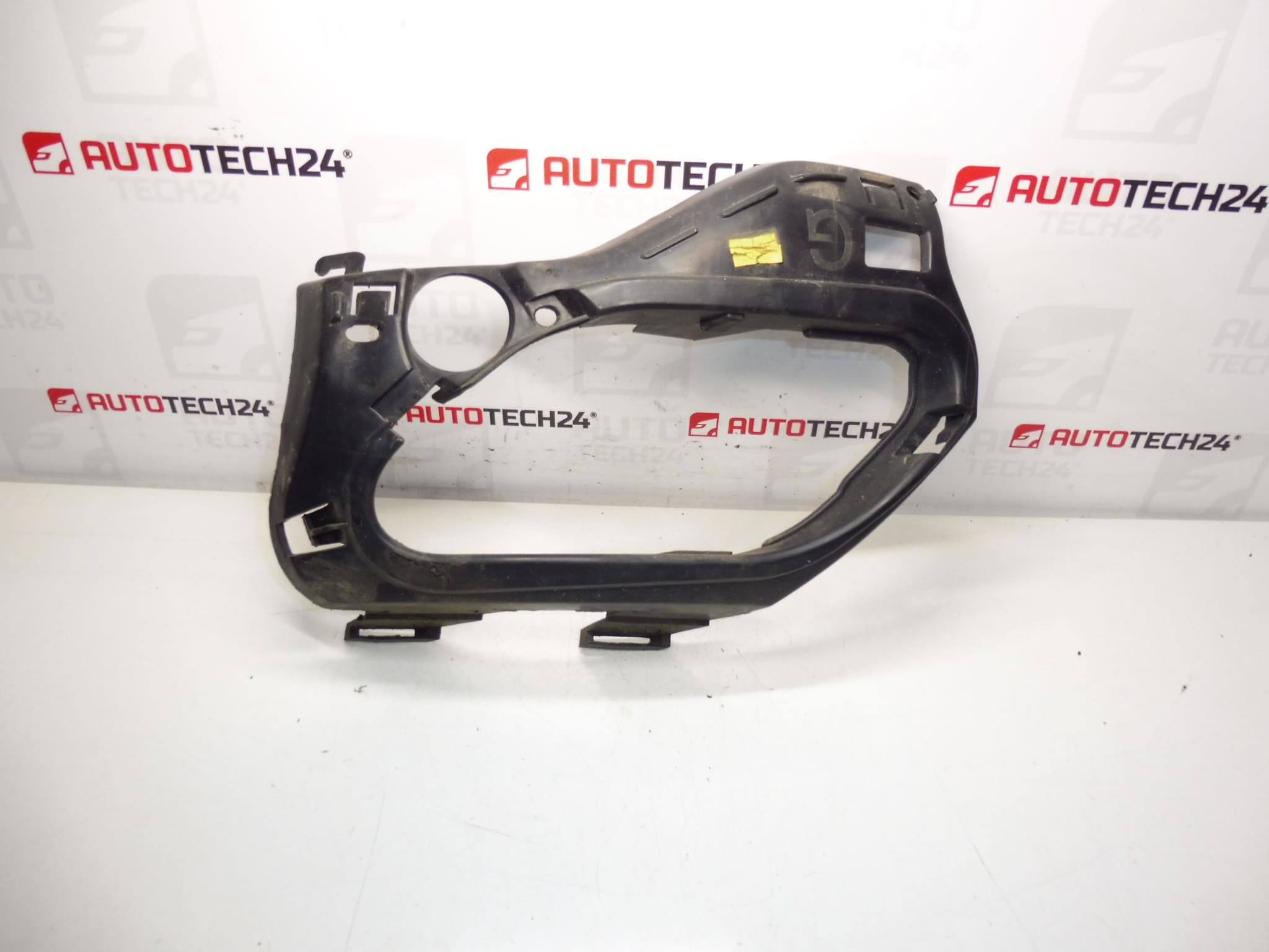 Okvir stražnjeg lijevog svjetla za maglu Citroën C4 Coupe 7414KE